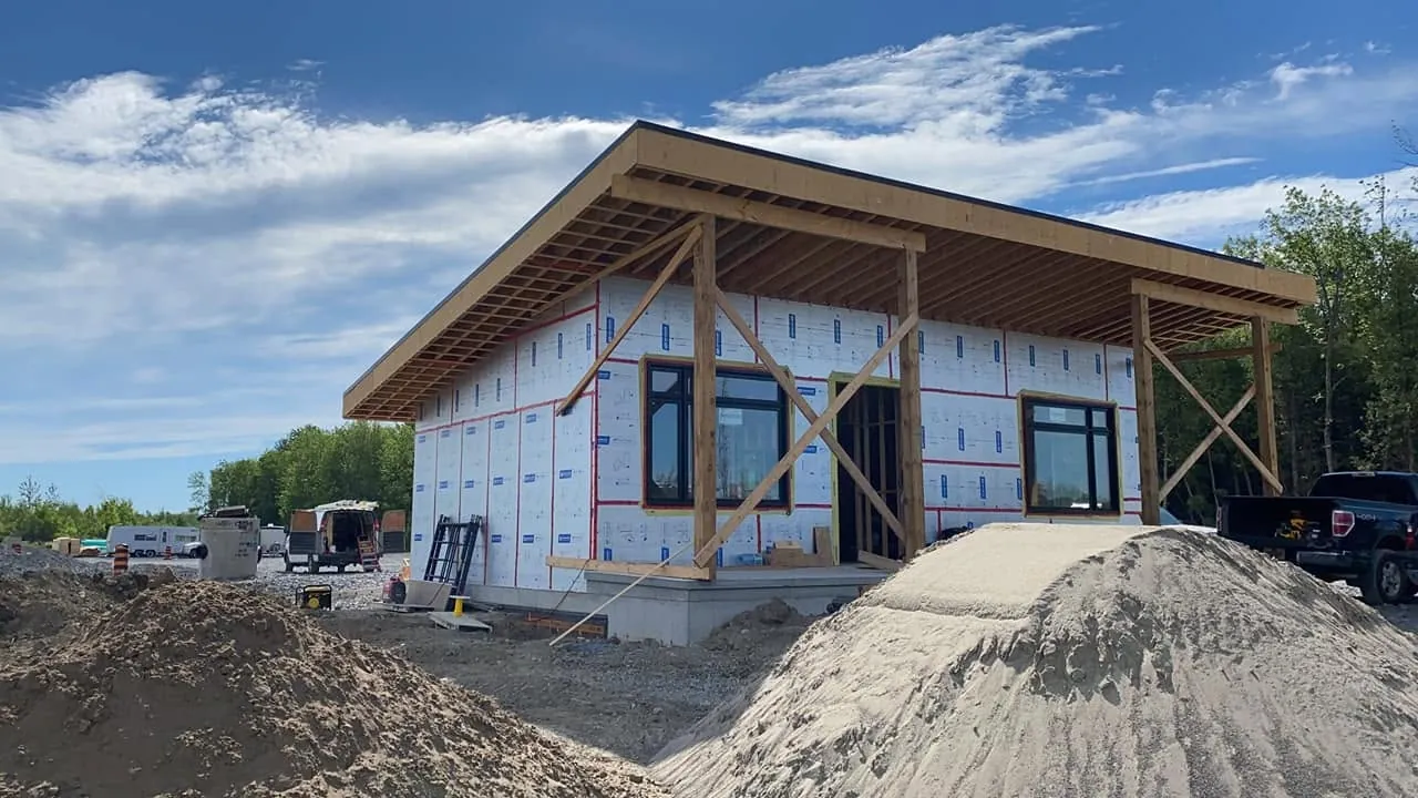 New commercial building under construction during the electrical rough-in stage.