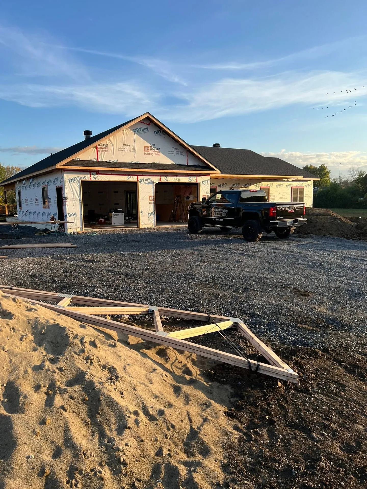Custom home under construction during the electrical rough-in phase.