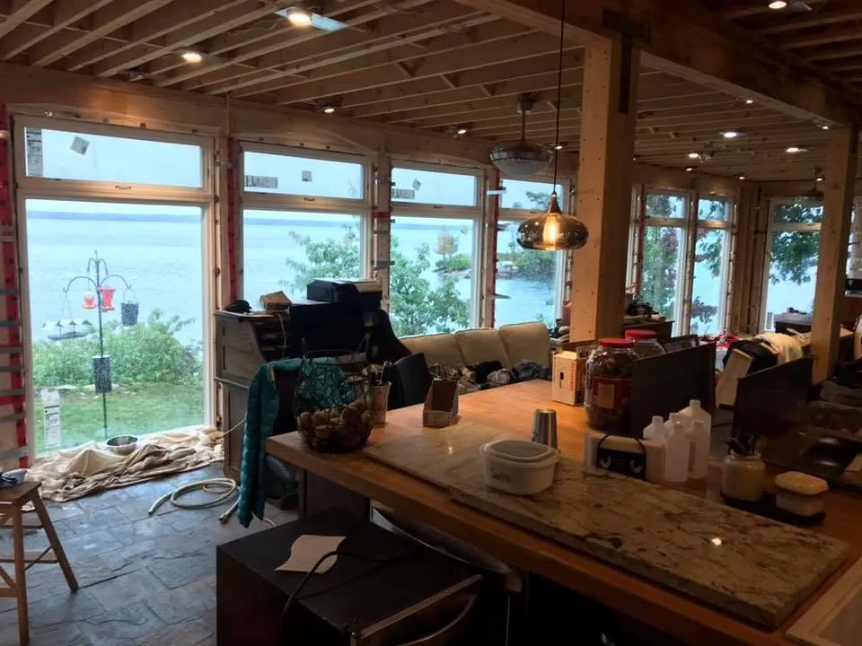 Pendant and recessed lights installed during a lake house renovation.